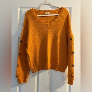 Orange Sweater with Button Accents